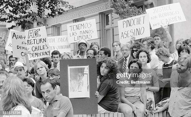 Group of demonstrators representing the Justice for Rojas/Quintana Ad-Hoc Coalition hold a rally outside the Chilean Embassy 7/11 in opposition to...