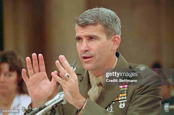 Washington: Lt. Col. Oliver North testifies before the Iran-Contra committee on the first day of his public testimony.