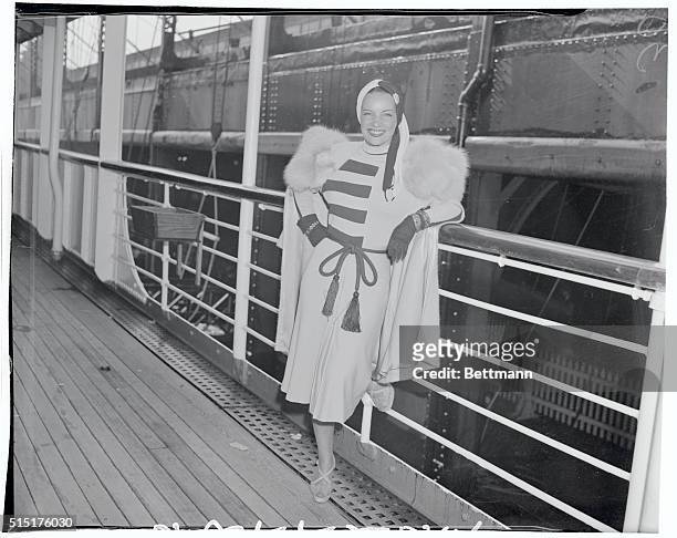 Carmen Miranda, famed Brazilian singer is pictured as she arrived in New York on the SS Uruguay. She is to appear in a musical review at the New York...