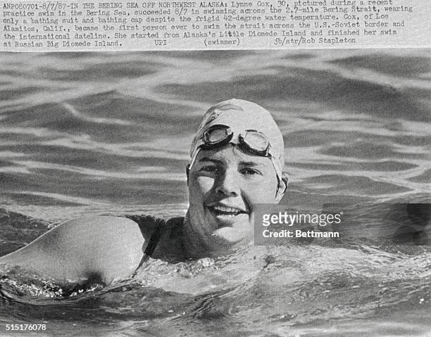Lynne Cox shown during a recent practice swim in the Bering Sea, succeeded in swimming across the 2.7 mile Bering Strait, wearing only a bathing suit...