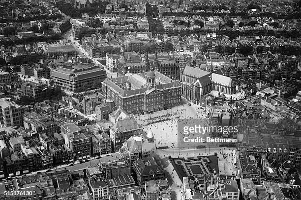 Amsterdam, The Netherlands: An aerial view of Amsterdam made from a royal Dutch K.L.M. Airlines plane. Amsterdam preserves the charm of the old with...