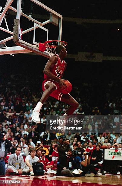 Michael Jordan of the Chicago Bulls gets set to dunk the ball during the slam dunk contest 2/8. Jordan won the contest.