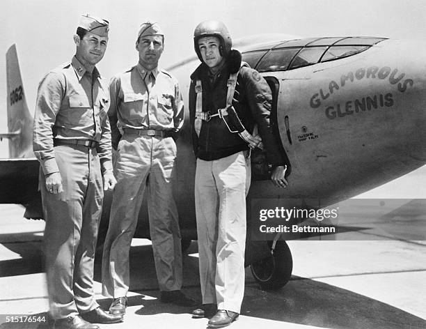 Muroc, California: Reveal Successful Supersonic Flights. Captain Charles E. Yeager, Major Gus Lundquist and Captain James Fitzgerald , stand before...