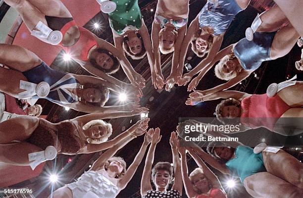 Atlantic City, New Jersey: Miss America contestants make a star on the stage in Convention Hall. Clockwise from top center are Miss South Dakota,...