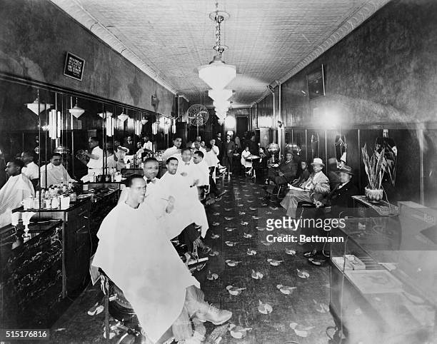 Large barber shop in Harlem. Photo ca 1929.