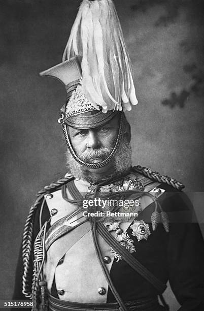 Head and shoulder photograph og George William F. Charles ; The Duke of Cambridge; In ornately decorated military costume and hat. BPA2