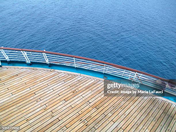 aerial view of cruise ship stern with deck & railing - timber deck stock-fotos und bilder