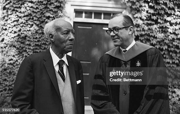 Cambridge, MA: A. Phillip Randolph , President, A. Philip Randolph Institute, labor and civil rights leader, is shown with Dean Lawrence E. Fouraker...