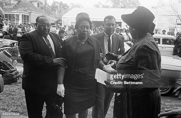 View of Alvin C & Alpha Robertson arrive for funeral services for their 14-year-old daughter Carole, Birmingham, Alabama, September 17, 1963. Carole...