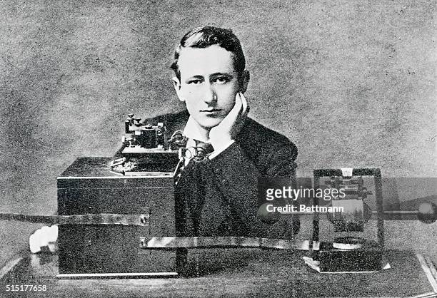 Guglielmo Marconi, Italian inventor, seated before his first wireless receiver in 1896 - at age 22.