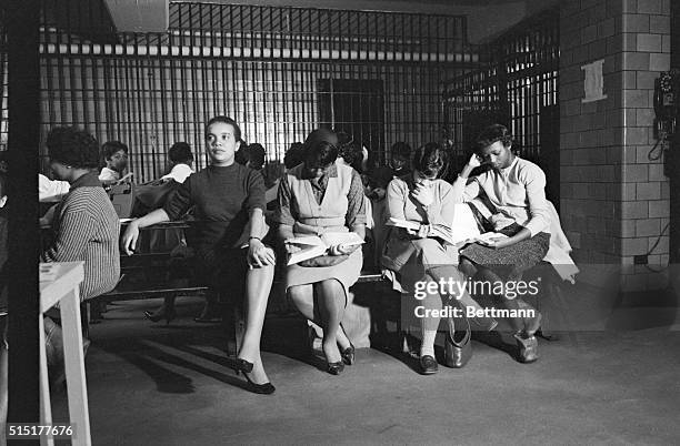 Atlanta, GA: Some of the Negro College girls arrested in a city-wide wave of restaurant sit-down demonstrations occupy a female detention room at the...