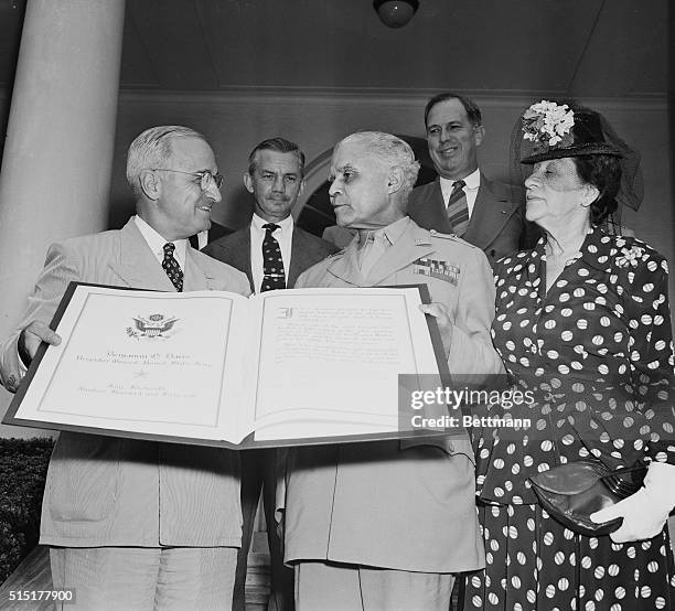 President Harry S. Truman presenting a special signed testimonial to Brigadier General Benjamin O. Davis , the only African American General in the...