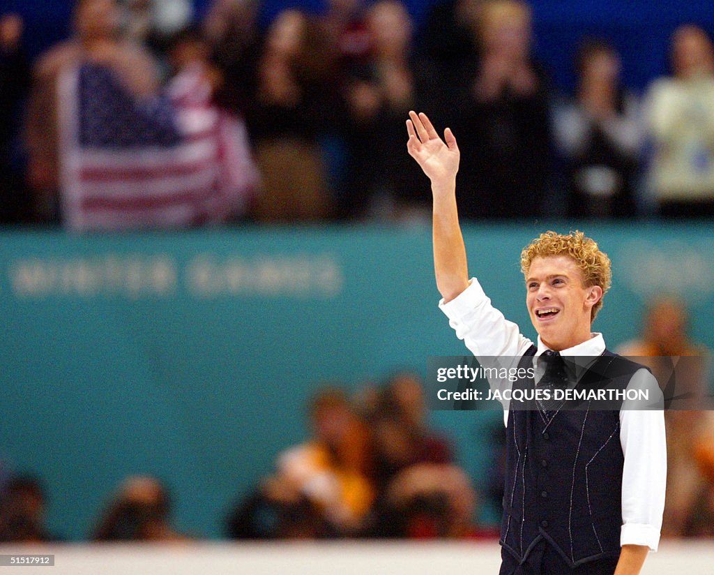Timothy Goebel of the US waves to the public after