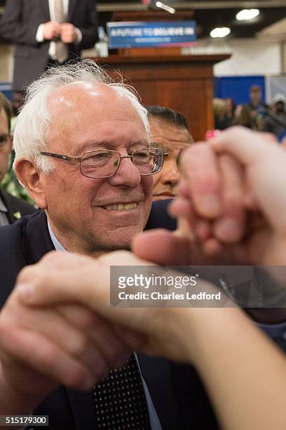 Democratic presidential candidate U.S. Sen. Bernie Sanders greets guests in the Activities and Recreation Center on the campus of the University of...
