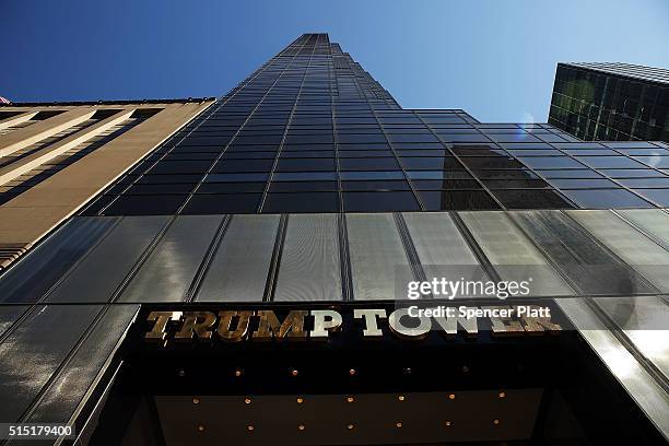 Trump Tower stands along 5th Avenue in Manhattan as police stand guard outside following an earlier protest against Republican presidential candidate...