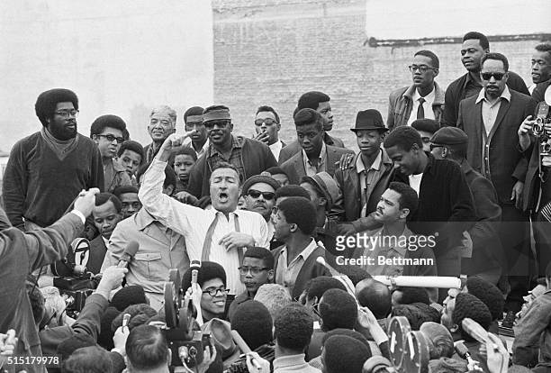 Los Angeles, CA: Rep. Adam Clayton Powell gestures as he gets a point across during his tour of the Watts area of Los Angeles 1/9. Powell,...