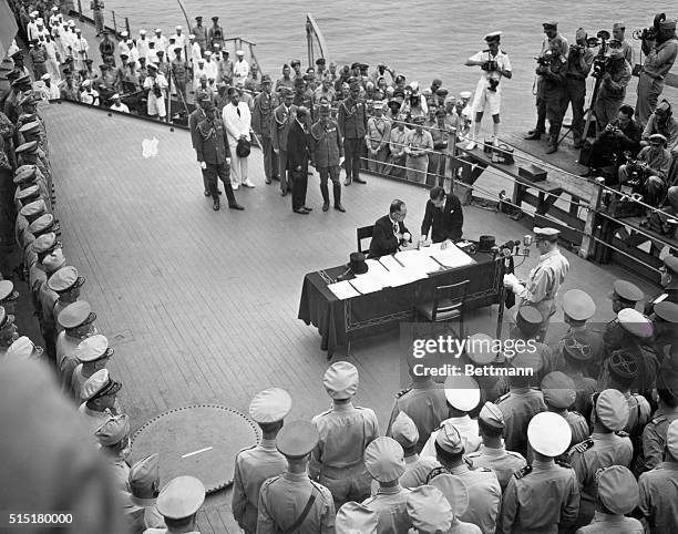 Ths surrender of Japan is broadcast over radio on board the USS Missouri. Japanese Foreign Minister Mamoru Shigemitsu signs the surrender treaty...