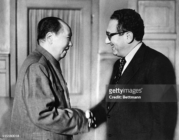 Peking, China: Chairman Mao Tse-Tung of the People's Republic of China meets U. S. Secretary of State Henry Kissinger here Nov. 12. Kissinger was...