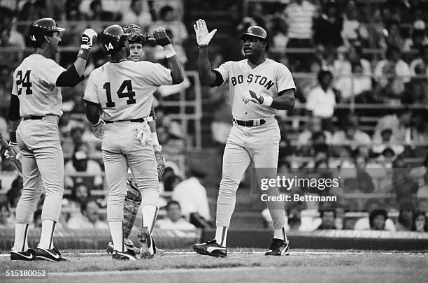 Chicago, IL: Boston Red Sox' Don Baylor is greeted by Jim Rice after he hit a two-run homerun, with Rice on base, in the fourth inning of the game...