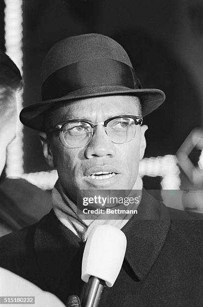 New York, NY: Members of the Black Muslims are shown demonstrating in Times Square, protesting the arrest of Negroes on what they call false charges....