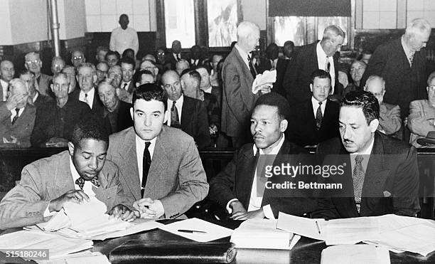 Ocala, FL: Seated in the crowded courtroom during the second trial of Walter Lee Irvin are, Left to Right: Paul C. Perkins; Jack Greenberg, New York...