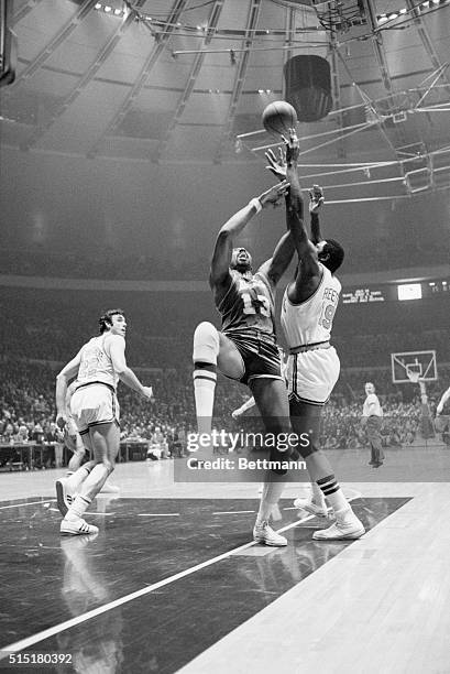 New York, NY - Willis Reed of the New York Knicks battles for the ball with Wilt Chamberlain of the Los Angeles Lakers under the basket May 8 at the...