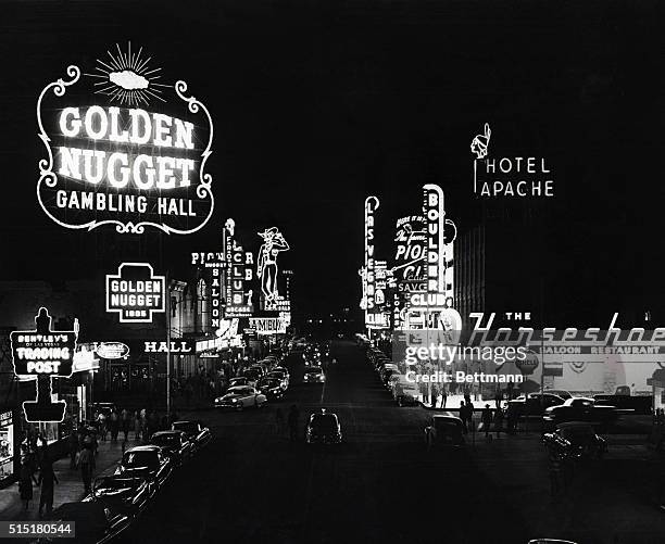 Las Vegas, NV: Neon signs advertising the legalized gambling establishment in downtown Las Vegas light up the night sky. But gambling is a...