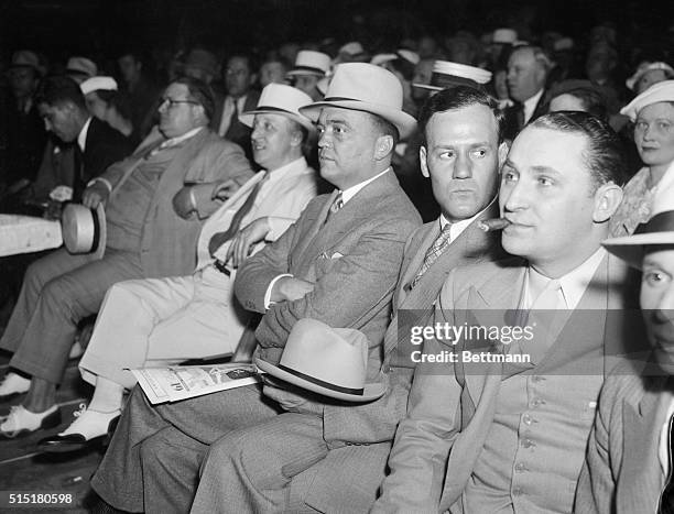 Washington, D.C.- J. Edgar Hoover , head of the Department of Justice, is pictured here attending the Frankie Klick-Tony Canzoneri fight. Hoover,...