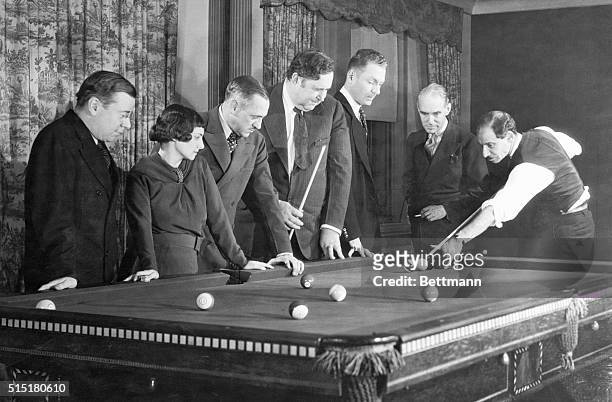 New York, NY: Proffesional observers and pace-setters are these seven gathered at a pocket billiard table in the Carom Club, New York's society...
