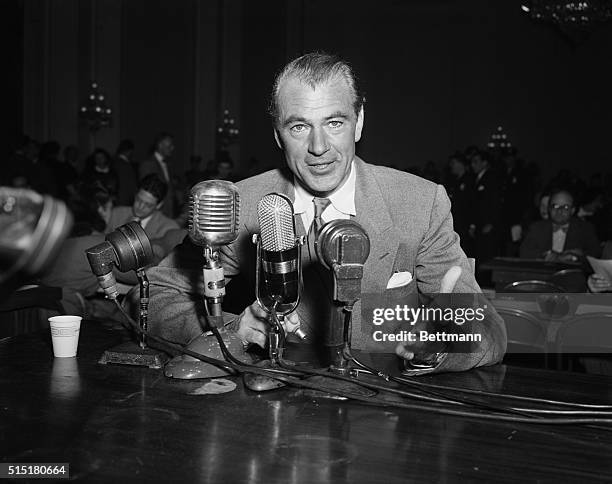 Washington, D.C.: Gary Cooper, long-time screen star, is pictured as he told the House Un-American Activities Committee today that he rejected a...