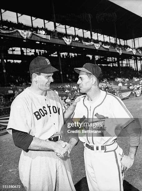 St. Louis, MO: Ready to swing into the final game of the World Series, starting pitchers Dave Ferriss of the Red Sox, and Murray Dickson of the...