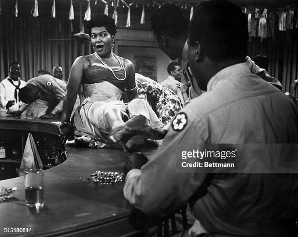 Movie still of Pearl Bailey in the 1954 film "Carmen Jones," an updated African American version of Bizet's opera, set in the South. Bailey is...