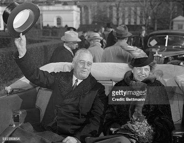 President and Mrs. Roosevelt riding in car on the President's third inauguration day.