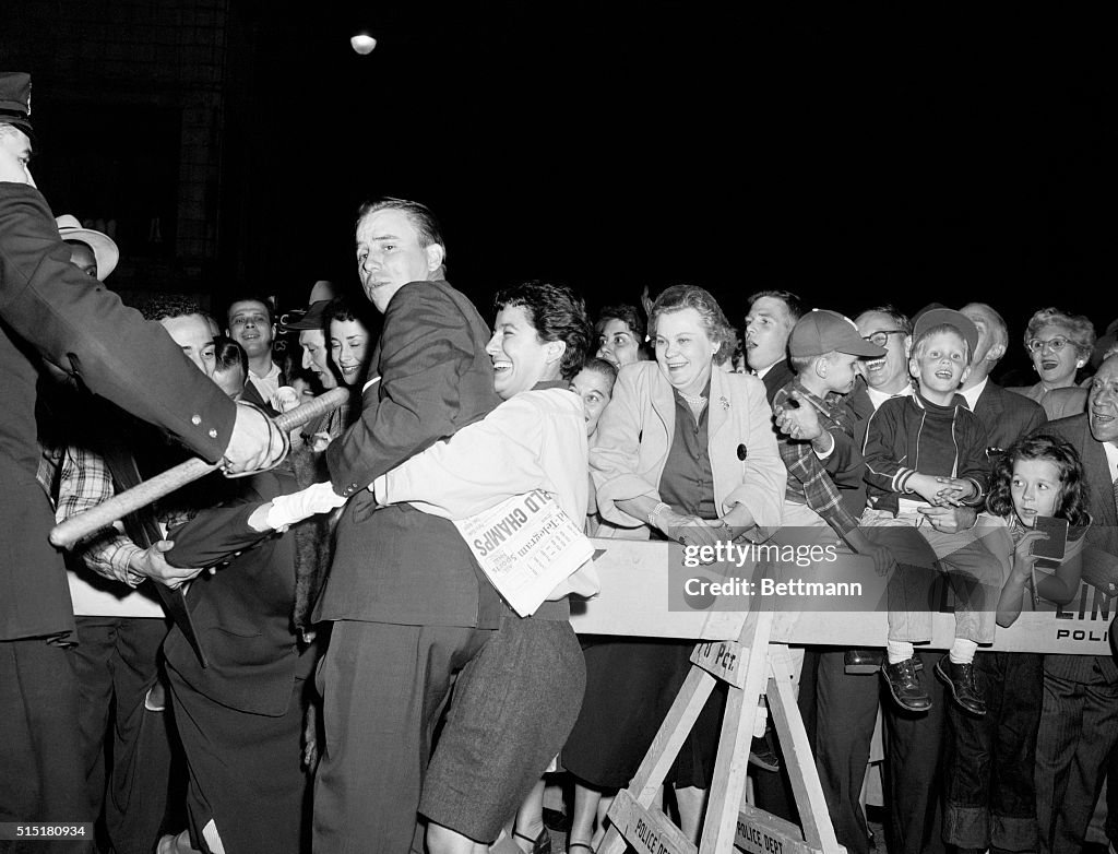 Fan Hugs Dodger Player Peewee Reese After Championship Win