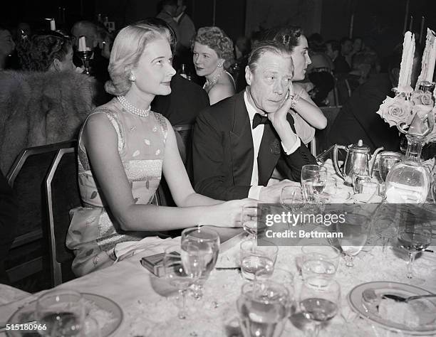 New York, NY: The Duke of Windsor chats with Mrs. Winston Guest at the swank Knickerbocker Ball at the Waldorf-Astoria Hotel, Dec. 14. Proceeds from...