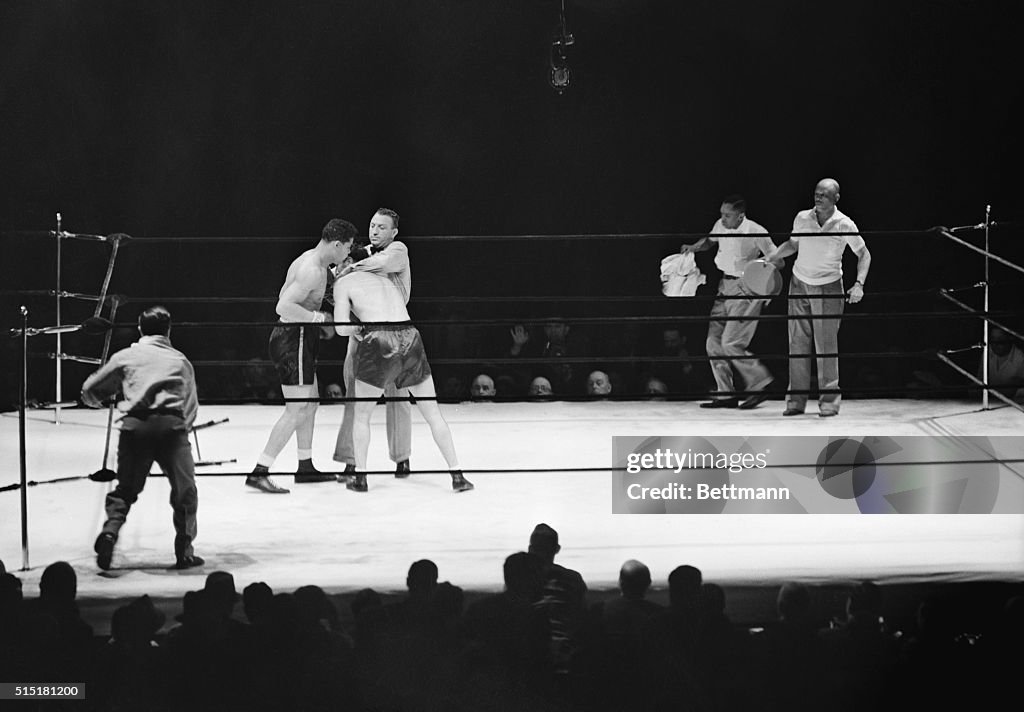 Referee Forcing Joe Louis and Max Schmeling Apart