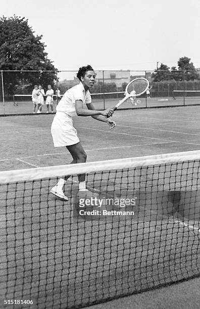 American tennis player Althea Gibson practices for the National Open at the West Side Tennis Club in Forest Hills for the first time.