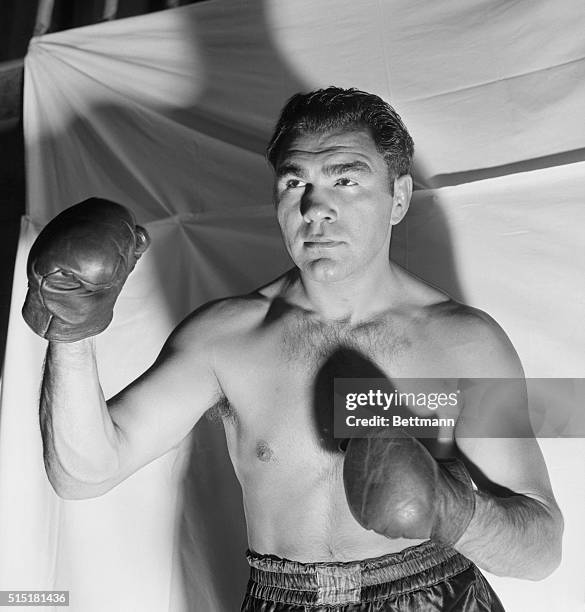 Max Schmeling, former Heaveyweight Champion of the World from Germany, in boxing pose.