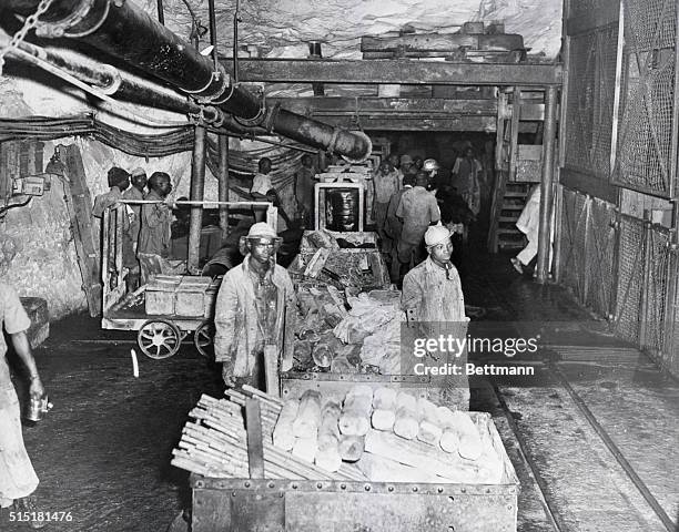 South Africa- Tools and timber stand ready in carts to be sent to any part of the mine where they are needed, in this view of the Sallies Gold Mine...