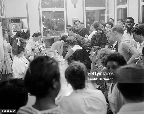 New York, NY- Members of CORE stage a sit-in demonstration at the White Castle diner in the Bronx late July 13th. During the all-night demonstration,...