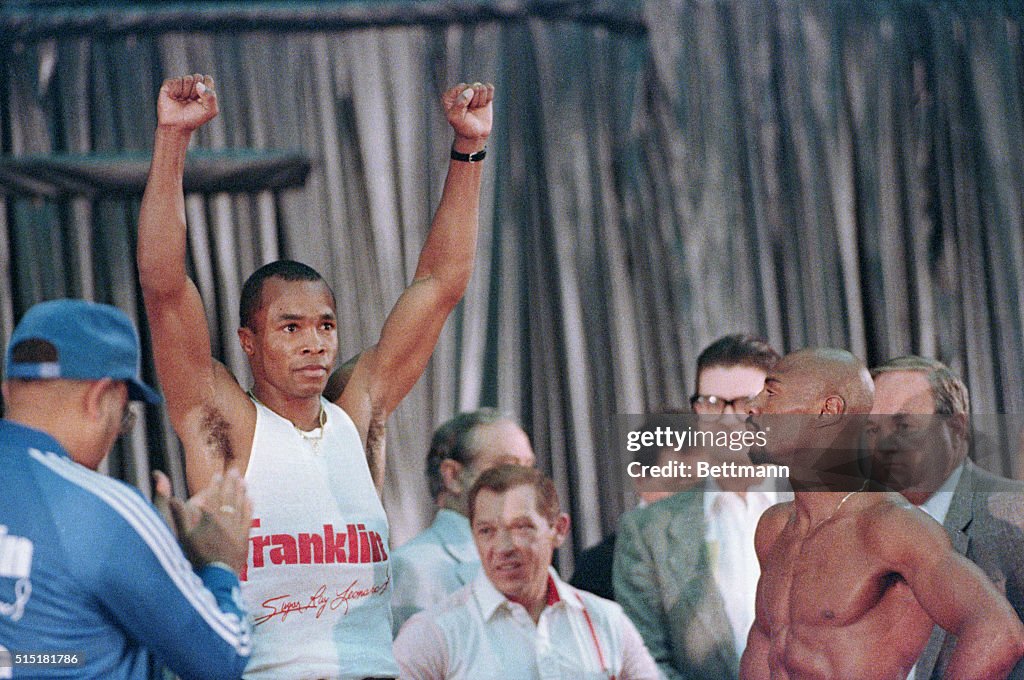 Sugar Ray Leonard Raising Arms On Scale