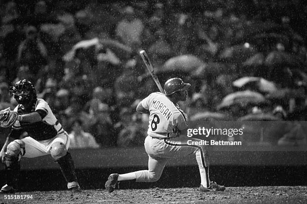 Baltimore, MD- Swingin' in the rain, Philadelphia's Joe Morgan battles the Birds of Baltimore and a steady downpour in the ninth inning. He popped...