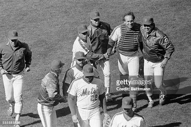 New York, NY- Mets' manager Davey Johnson hugs catcher Gary Carter after the Mets beat the Chicago Cubs 4 to 2 at Shea Stadium. Gary Carter, who had...