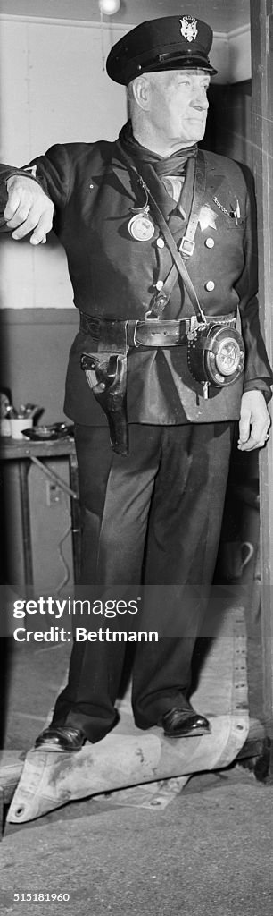 Tom Sharkey In Night Watchman'S Uniform