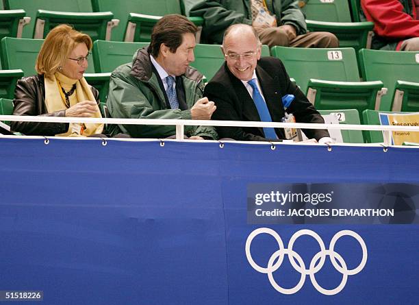 International Skating Union president Ottavio Cinquanta and Israel's International Olympic Comittee member Alex Gilady share a laugh as they watch...