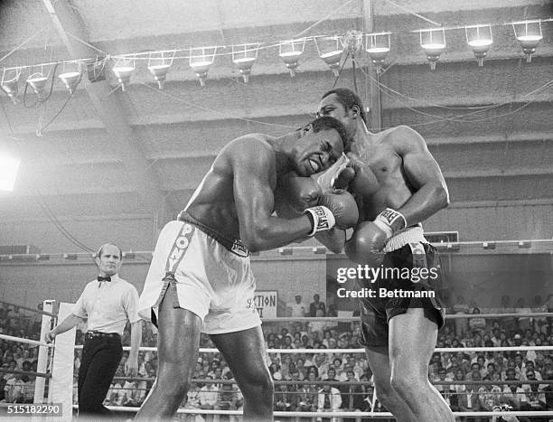 Las Vegas, NV- Larry Holmes, Easton, PA, takes a hard shot to chin from Ken Norton, Los Angeles, during the 6th round of their title fight 6/9 at...