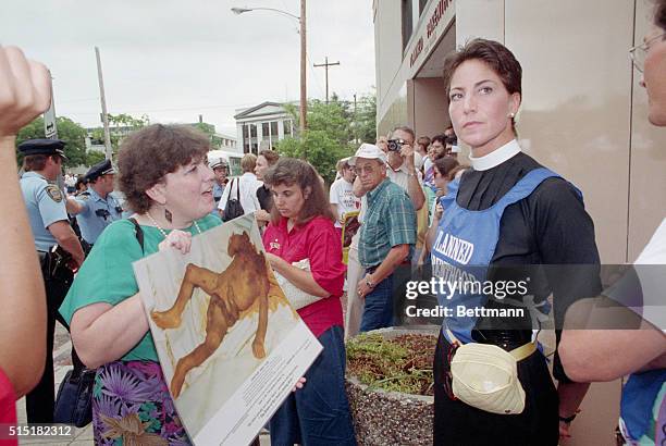 Houston, TX: Photo shows a pro-life demonstrator confronting a Planned Parenthood backer outside the Planned Parenthood abortion clinic in Houston...