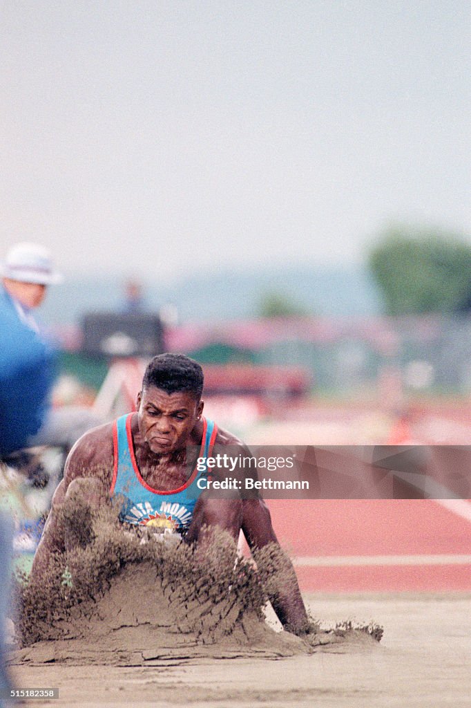 Carl Lewis Lands In Sand After Long Jump