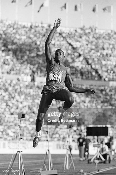 Helsinki, Finland- America's Carl Lewis wins the long jump event at the World Track and Field Championship, with a jump of 8.55 meters for a gold...