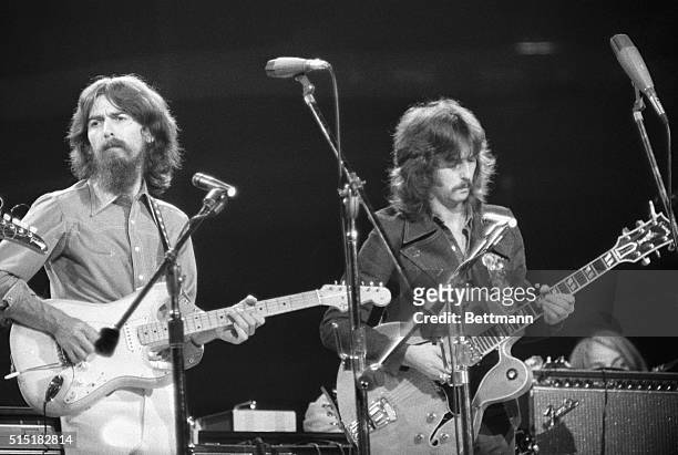 George Harrison and Eric Clapton performing at the Concert for Bangladesh at Madison Square Garden.